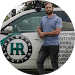 A man standing in front of a white van with the HR logo on it for the Helmuth Roofing website refresh.